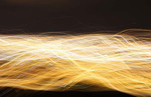 light trail time lapsed photography of yellow light yellow
